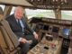 Joe Sutter on the flight deck of a Boeing 747 (Image: Boeing)