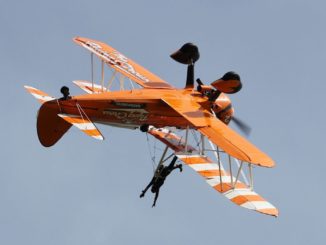 Seeing the world upside down is all in a days work for a wingwalker. (Image : UK Aviation Media)