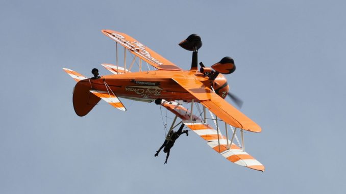 Seeing the world upside down is all in a days work for a wingwalker. (Image : UK Aviation Media)