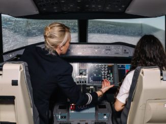 Trying out the simulator at the BA Flying Futures event (Image: BA / Stuart Bailey)