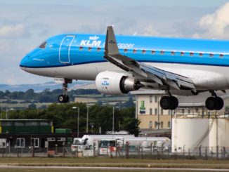 A KLM Embraer lands at Cardiff Airport (Image: TransportMedia UK)