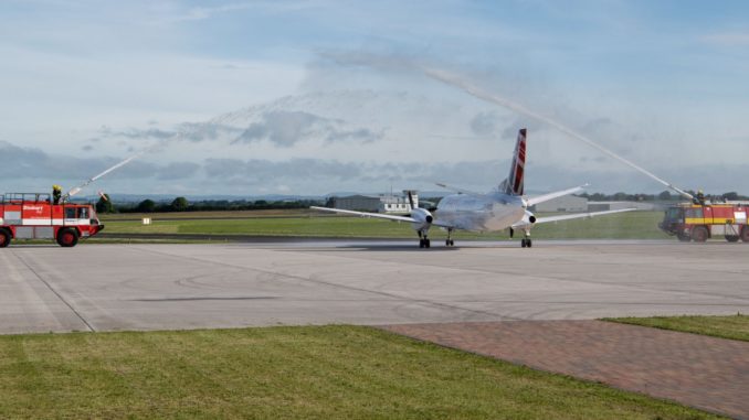 Loganair Saab 340 gets water cannon salute at Carlisle Airport launch