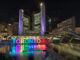 Toronto City Hall and Toronto sign in Nathan Phillips Square at night, Ontario, Canada.