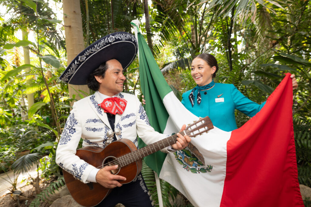 Pictured is performer Johnny Arias alongside Aer Lingus Cabin Crew Alannah Prunty at the launch of the launch of Ireland’s first direct flight from Dublin to Cancun starting in January 2026. The new route will operate on the A330 300 aircraft, offering Irish travellers a seamless route to the warmth of Mexico’s stunning beaches and vibrant cultural heritage. This new direct service provides an effortless way for those looking to escape the cold Irish winter months, all while avoiding the hassle of long stopovers. For more information, visit aerlingus.com (Image:Naoise Culhane)