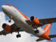 An easyJet Airbus lands at Gatwick Airport (Image: UK Aviation Media)