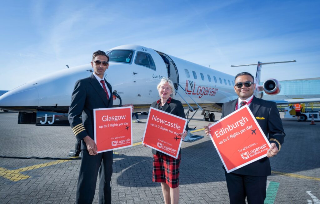 L-R: Loganair Captain Mahmood Nasib, cabin crew Sandra Thomson and First Officer Nischal Shakya