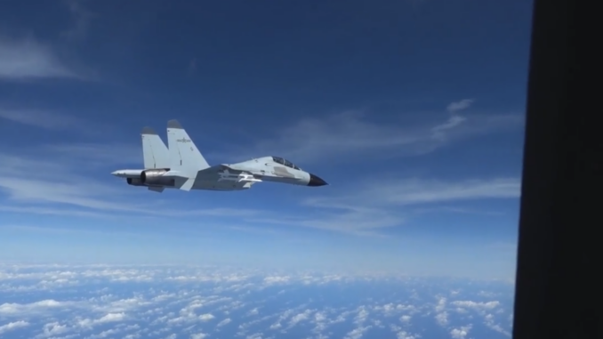 Chinese J11 Fighter intercepting US RC135